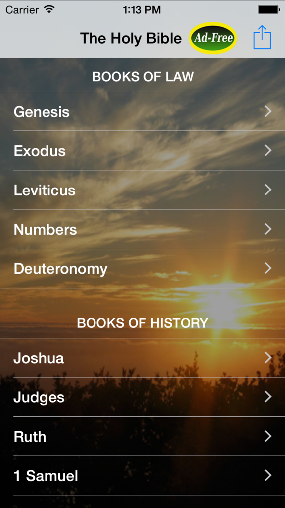 Interface of the King James Bible app showing a list of books from the Old Testament over a sunset background.