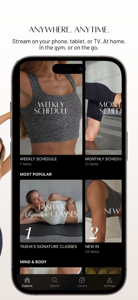 iPhone screen displaying the TF STUDIO Pilates app with workout schedules and signature classes