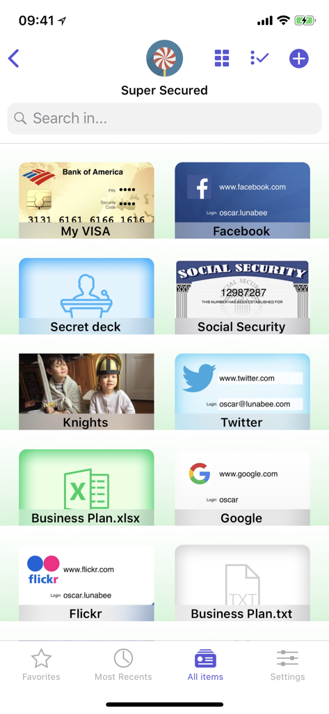 A grid view of the oneSafe password manager app displaying various stored items like credit cards social media accounts and secure documents