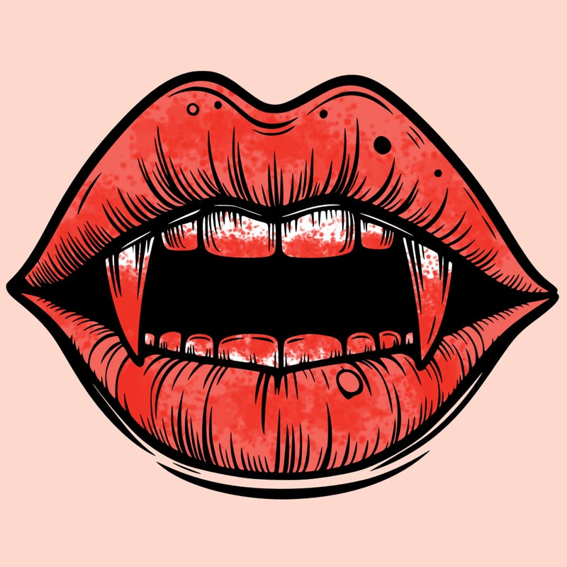 lips with vampire teeth