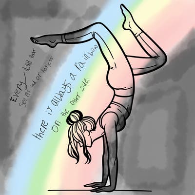 a woman doing a handstand