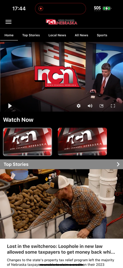 News Channel Nebraska mobile app interface displaying a live news broadcast and local top stories