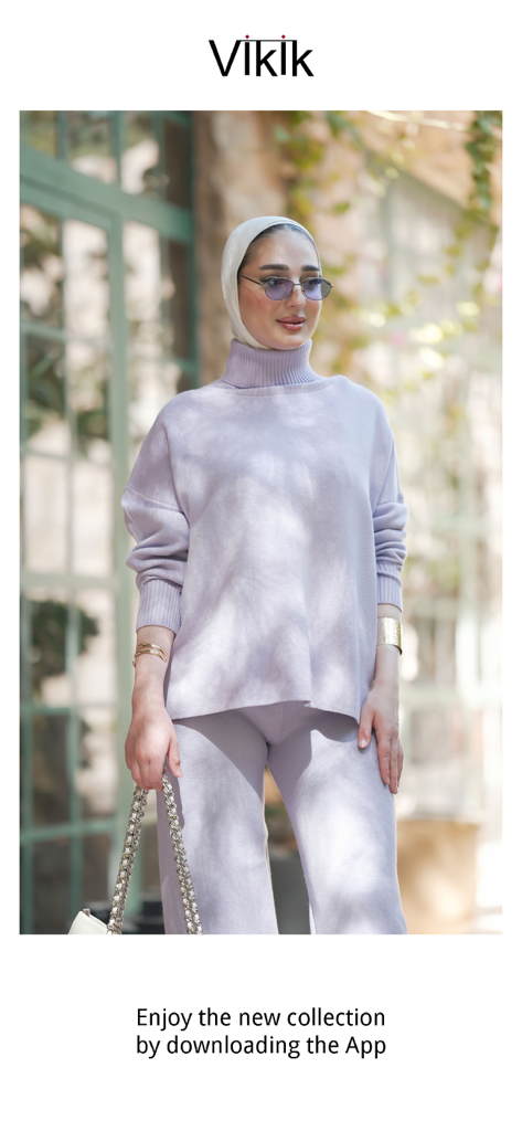 Vikik - Uma mulher elegante usando um conjunto de malha roxa da nova coleção do aplicativo Vikik