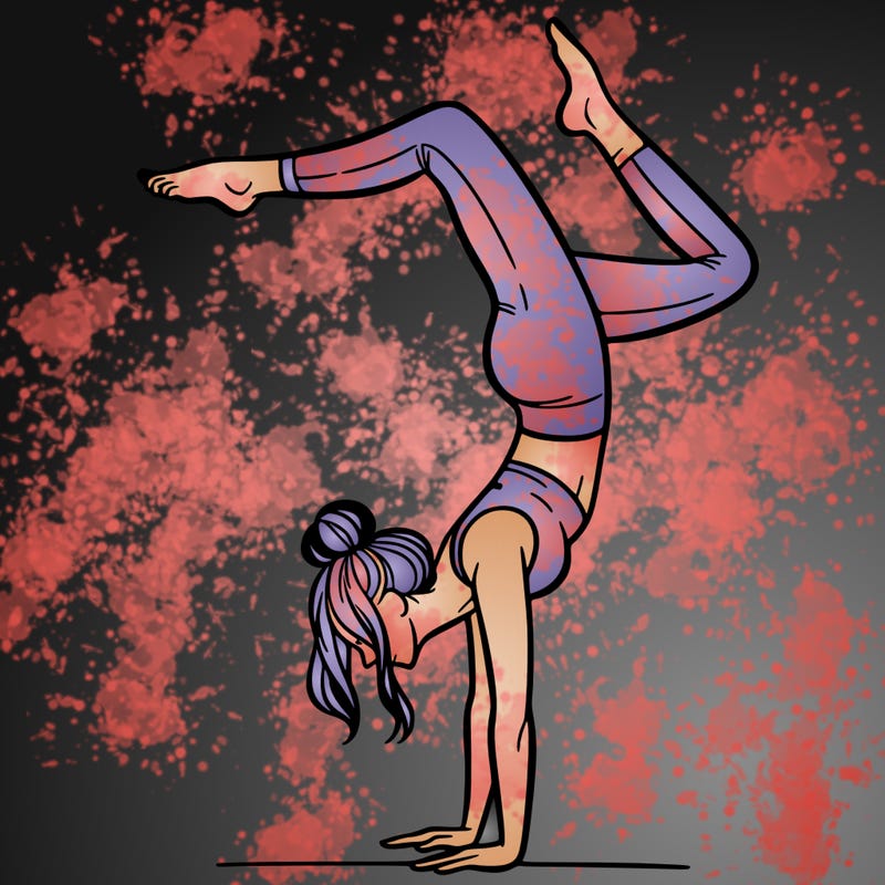 a woman doing a handstand