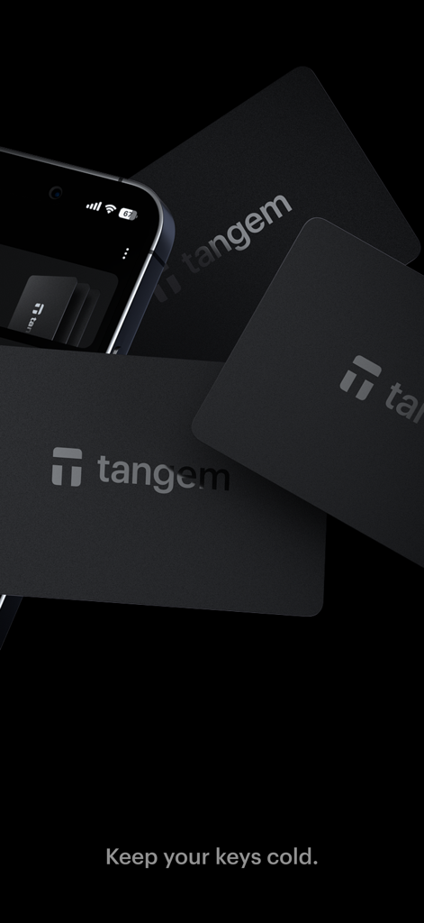 Three black Tangem hardware wallet cards and a smartphone on a black background with the slogan Keep your keys cold