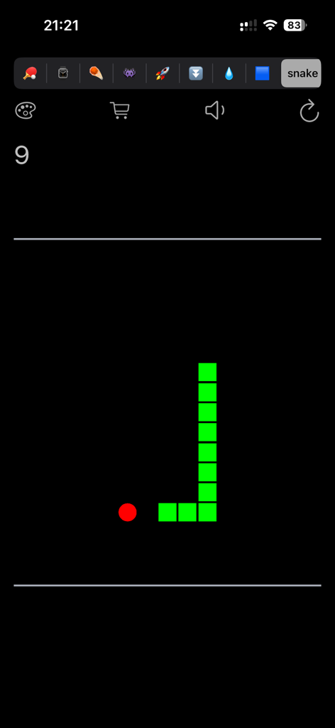 Screenshot of the classic snake game mode with retro green blocks and a red target on a black background