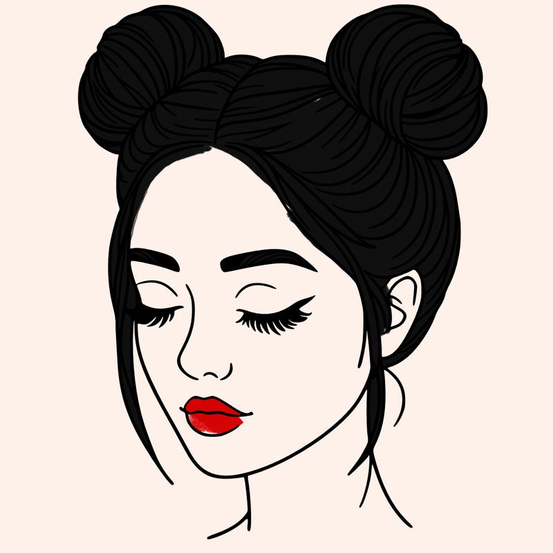 woman with hair buns