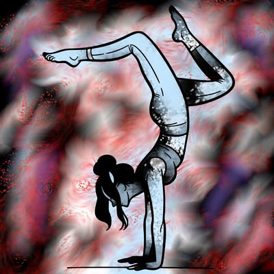 a woman doing a handstand