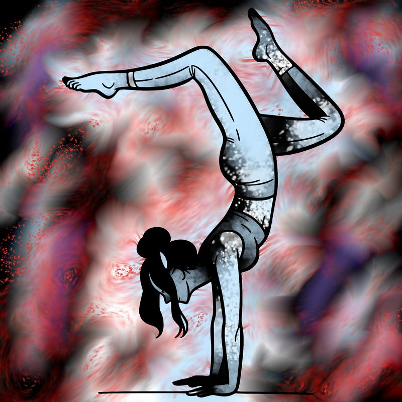 a woman doing a handstand