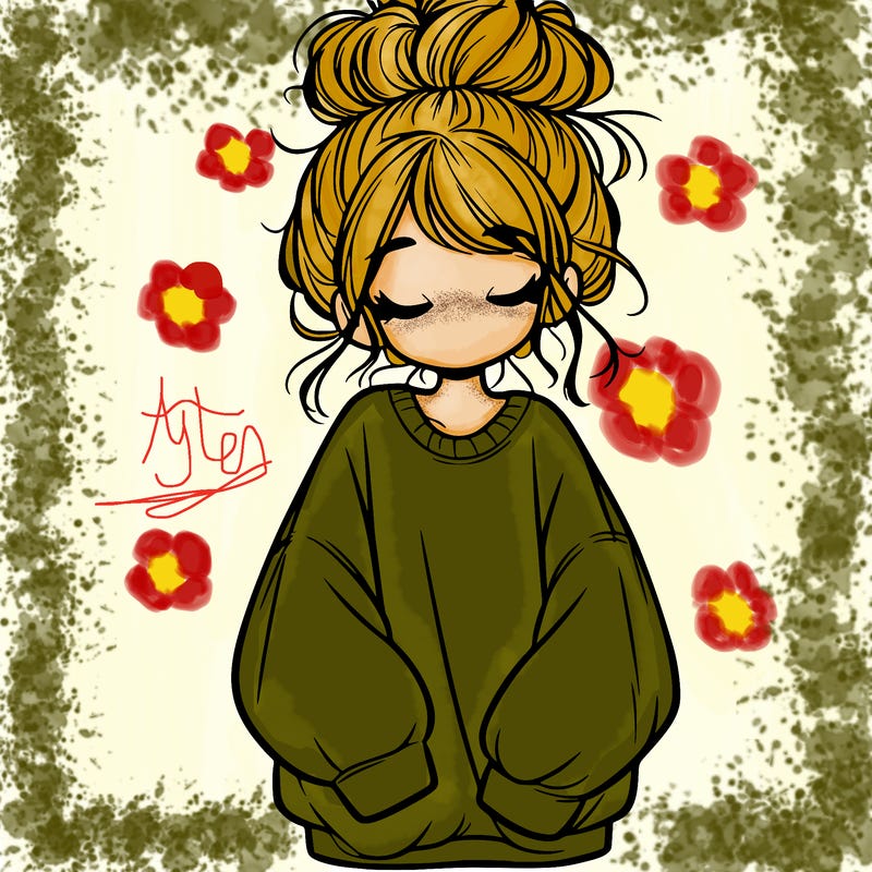 girl with baggy sweatshirt and messy bun