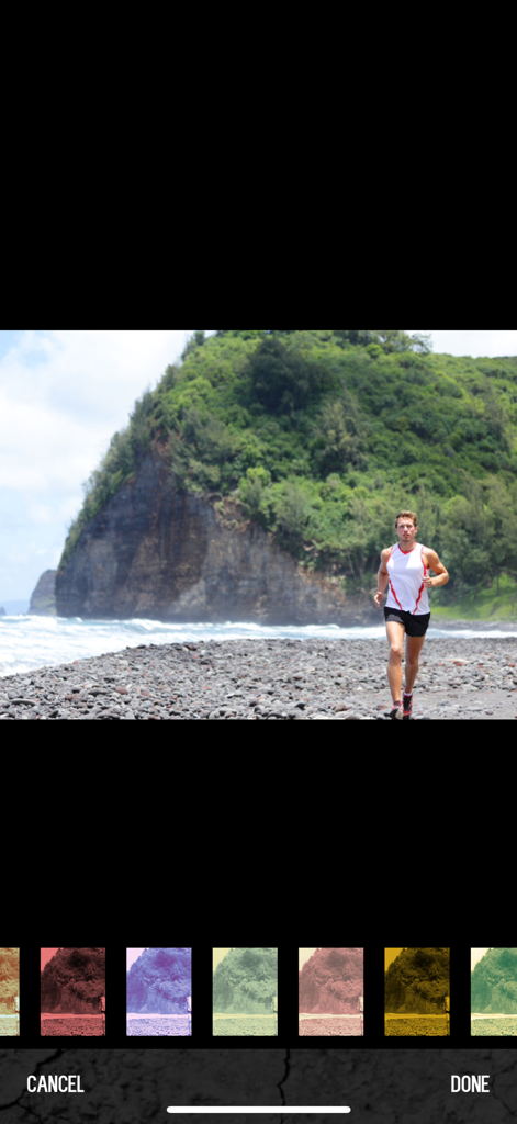 Slidezilla - Slidezilla app interface displaying various color filter options for a photo of a man running on a beach