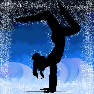 a woman doing a handstand