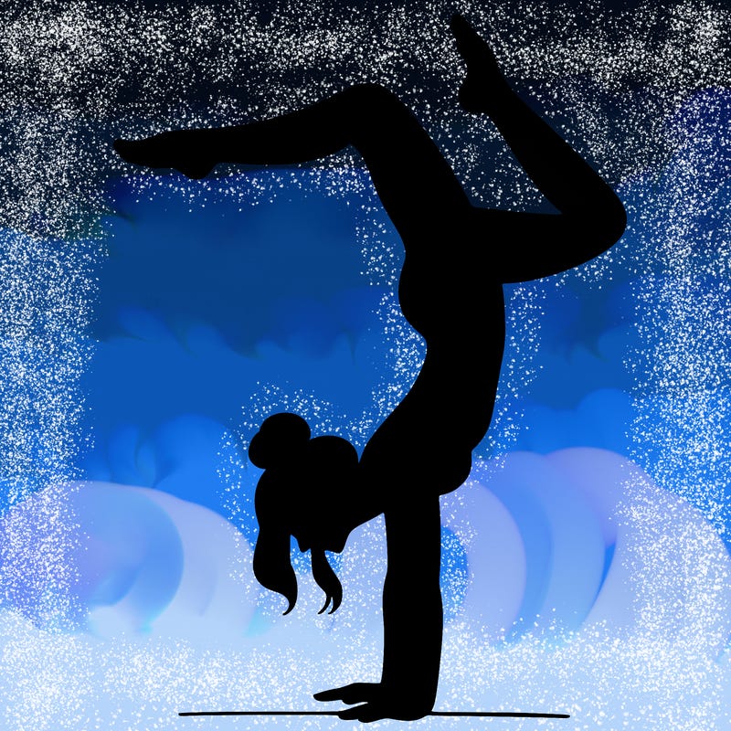 a woman doing a handstand
