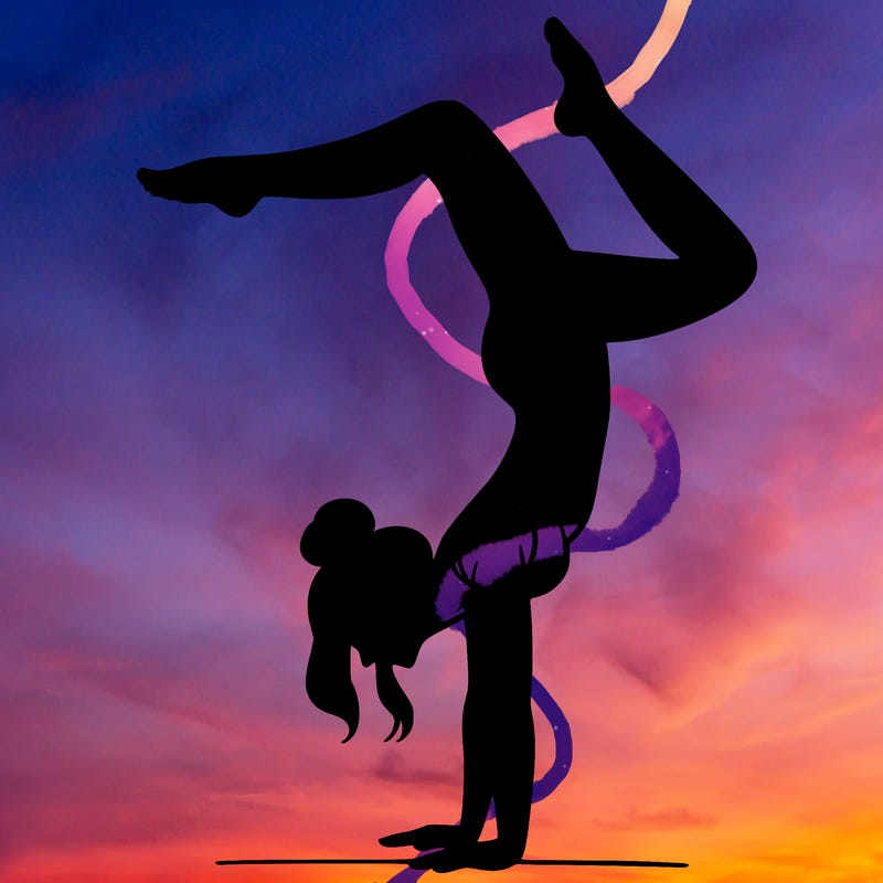 a woman doing a handstand