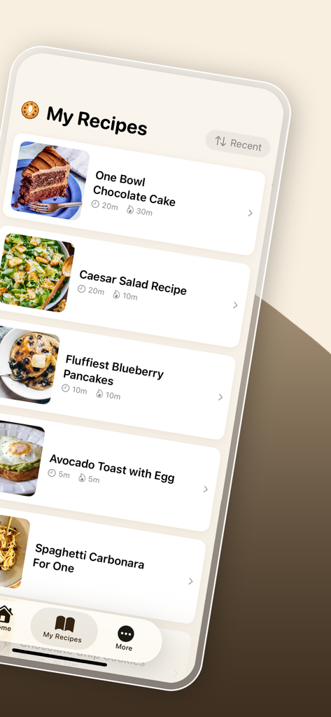 Cookie Voice Recipes - Una biblioteca de recetas digital en la aplicación Cookie Voice Recipes que muestra una lista de platos guardados, incluyendo pastel de chocolate y panqueques de arándanos.