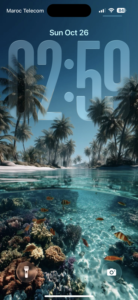 iPhone lock screen with a depth effect wallpaper of a tropical beach and coral reef