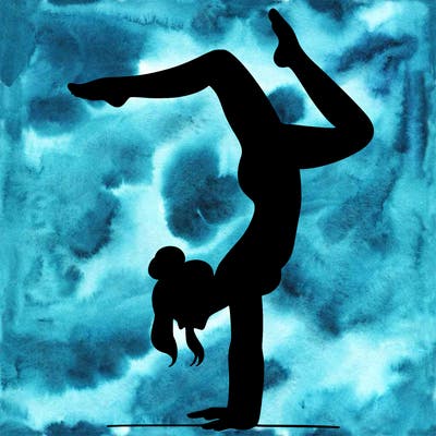 a woman doing a handstand