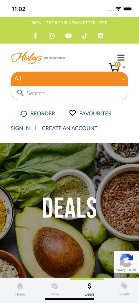 The deals page of the Hurleys mobile app featuring fresh grocery images and a navigation menu.