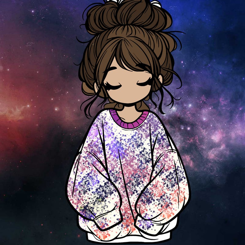girl with baggy sweatshirt and messy bun