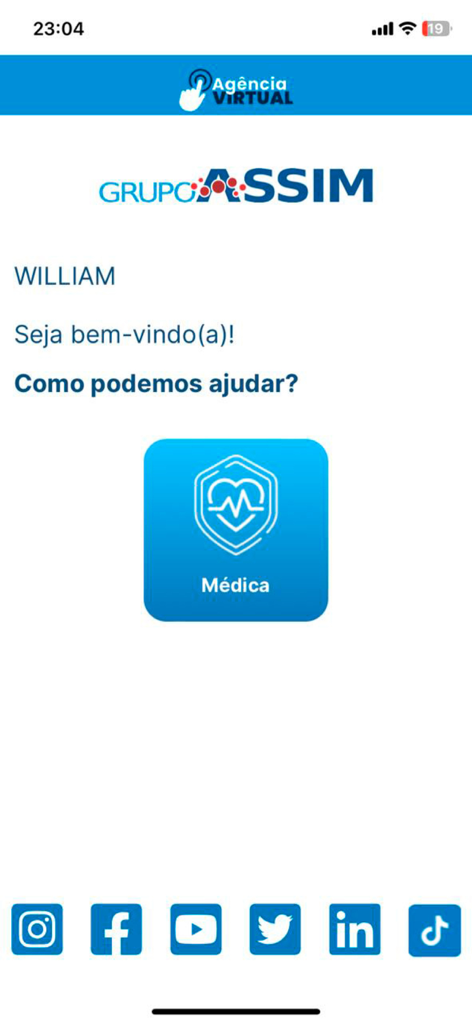 ASSIM SAÚDE - The welcome screen of the ASSIM SAUDE app displaying a personalized greeting and a medical services access button.