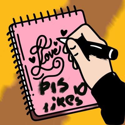 a hand writing “love” in calligraphy on a notebook