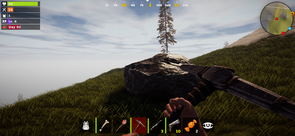 Just Survival Multiplayer - A first-person perspective of a player mining a large rock with a pickaxe in a grassy landscape