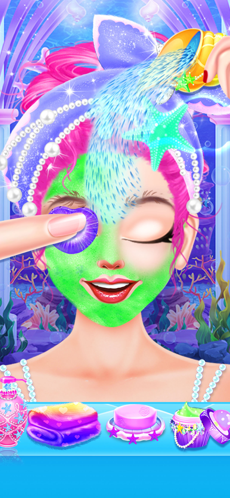 Mermaid Simulator! - A mermaid character receiving a facial treatment with a green mask and heart-shaped eye patches