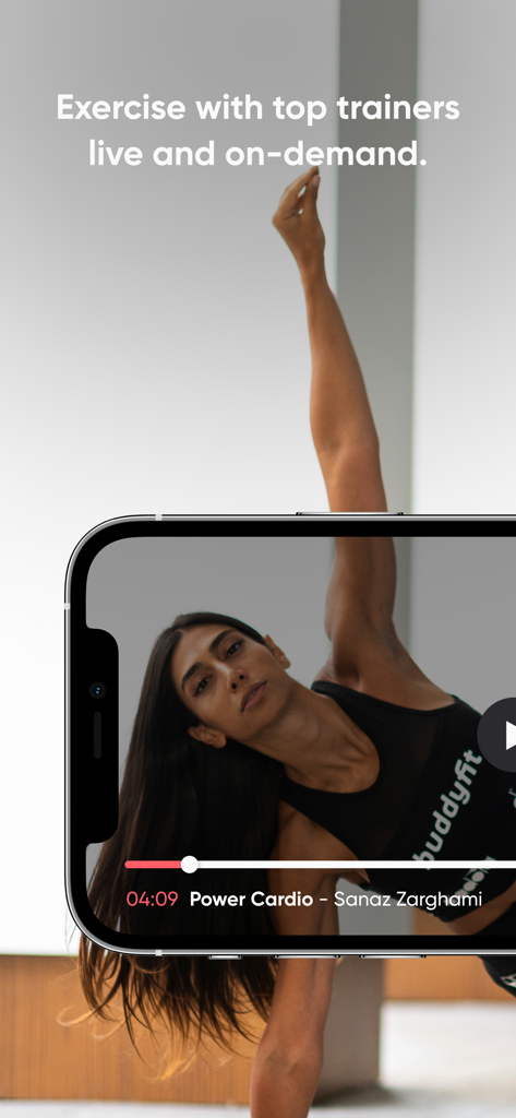 Buddyfit: Exercise at Home - A woman performing a Power Cardio exercise guided by a trainer on a mobile phone screen.