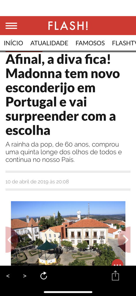 Un artículo de noticias en la aplicación Flash sobre Madonna encontrando un nuevo hogar en Portugal.