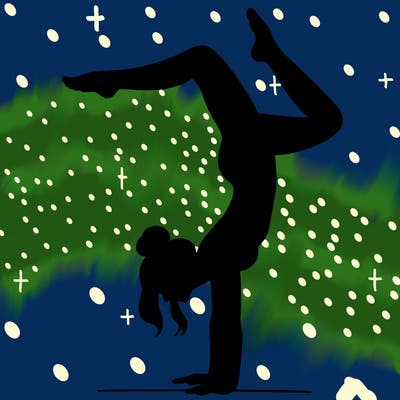 a woman doing a handstand