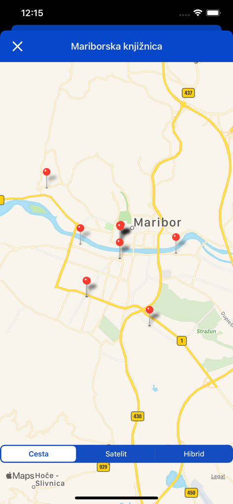 mCOBISS - Map view showing several library locations in Maribor with red pins in the mCOBISS app.