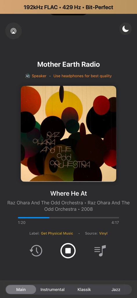 Mother Earth Radio - Mother Earth Radio app interface showing a dark mode music player with high-resolution FLAC streaming details and vinyl source information