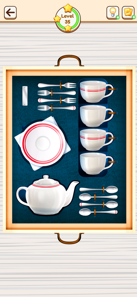 파란색 트레이에 찻주전자, 컵, 식기류가 깔끔하게 정리된 아늑한 퍼즐 레벨 스크린샷