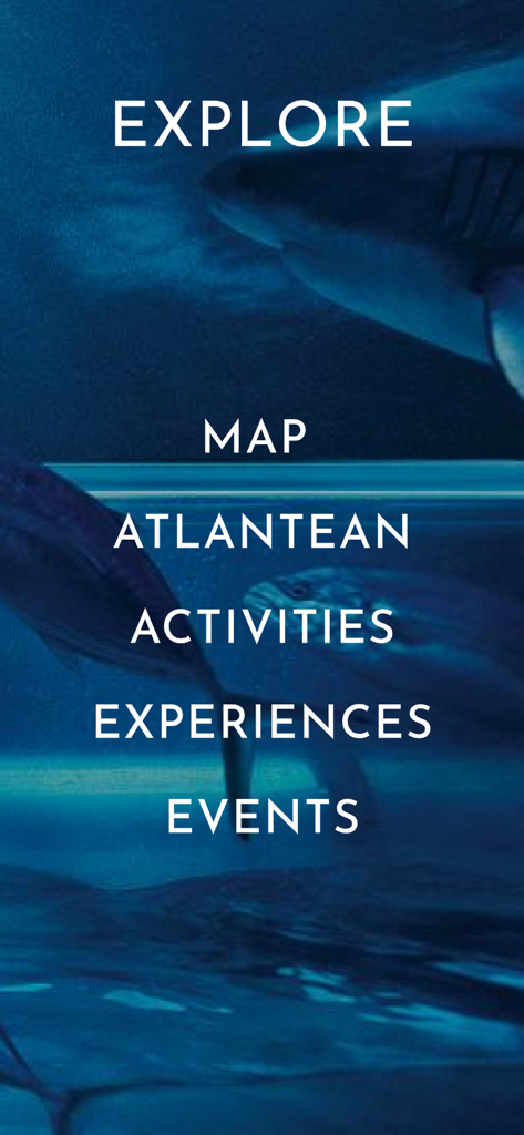 Atlantis Bahamas - アトランティス・バハマのモバイルアプリのナビゲーション画面。水中海洋生物の背景にメニューオプションが表示されています。