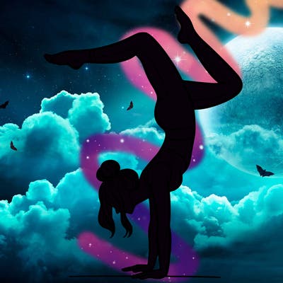 a woman doing a handstand