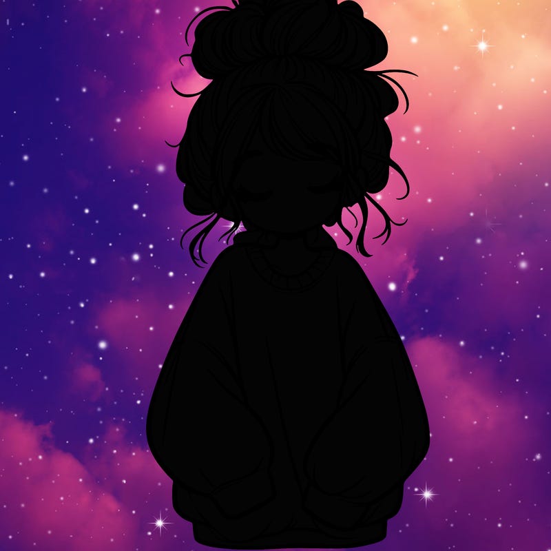 girl with baggy sweatshirt and messy bun