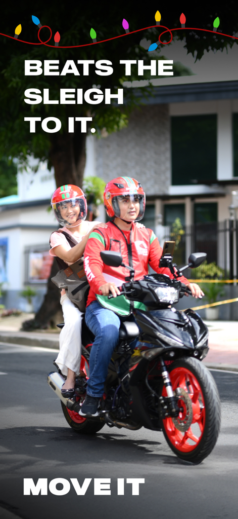 休暇のテーマのテキスト「Beats the sleigh to it」が書かれたMove Itバイクタクシーに乗る乗客とドライバー