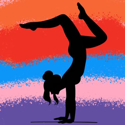 a woman doing a handstand