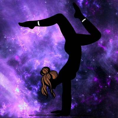 a woman doing a handstand