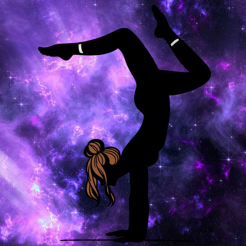 a woman doing a handstand