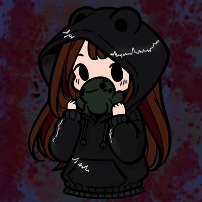 a girl holding a froggy hoodie