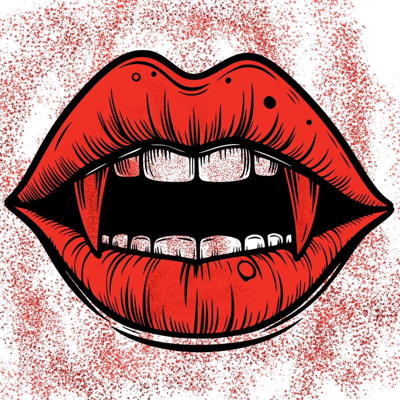 lips with vampire teeth