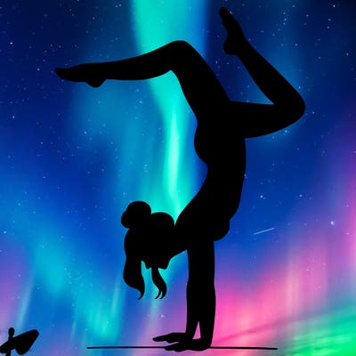 a woman doing a handstand