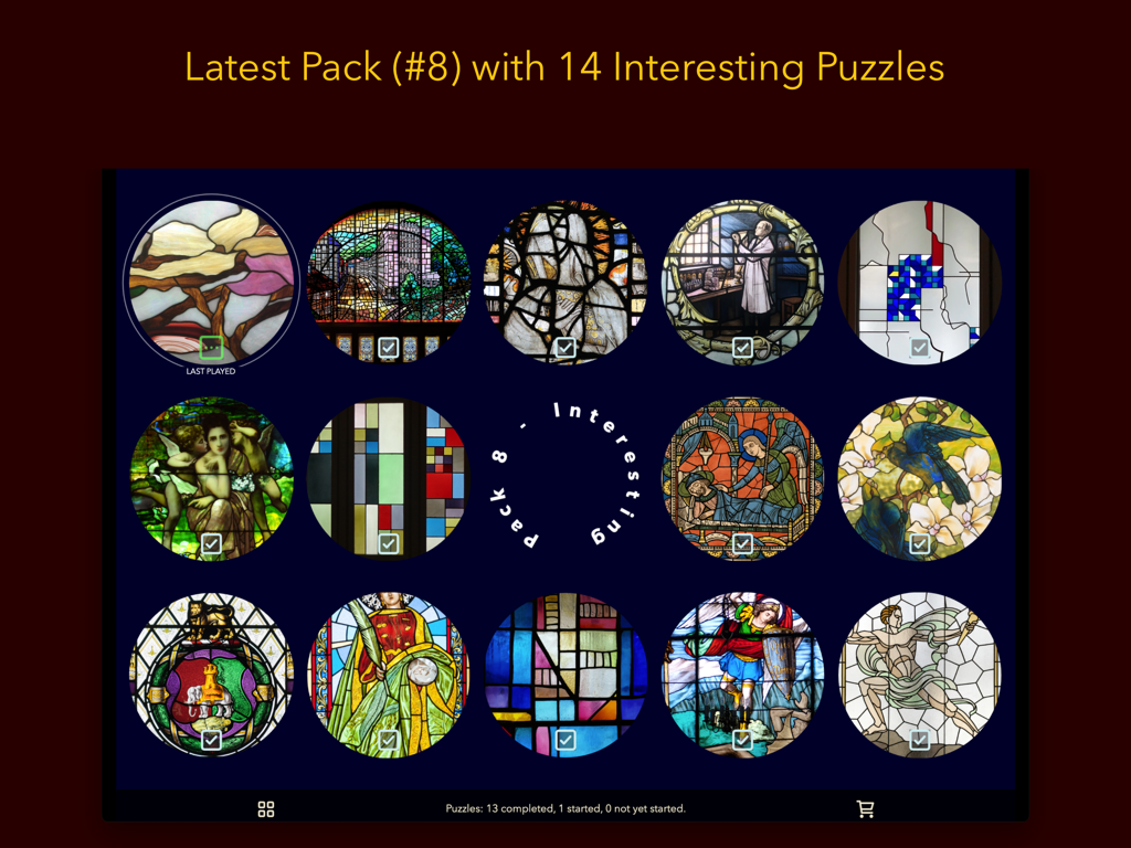Window Puzzlesアプリのメニュー画面に、最新のパズルパックから14個の円形ステンドグラスパズルのサムネイルが表示されます。