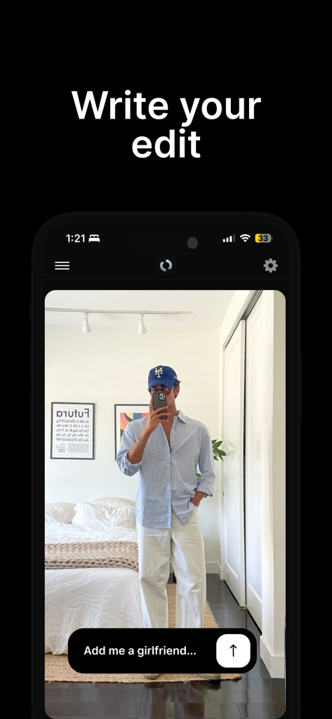 Mobile app interface of Ploxto AI photo editor showing a user writing an edit prompt for a mirror selfie photo