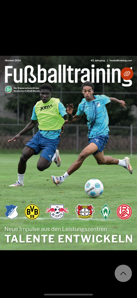 Cover of Fussballtraining magazine featuring youth soccer players and German club logos