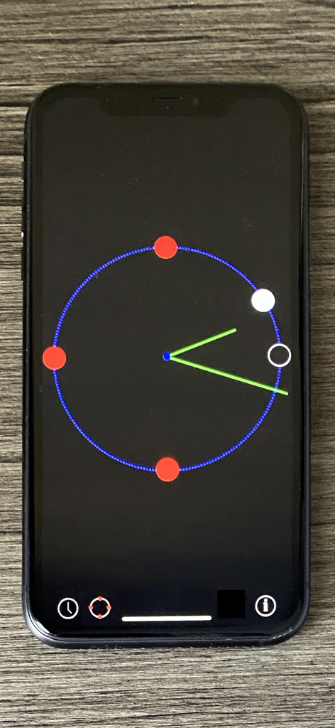 Spot o'clock - O aplicativo Spot o clock no iPhone mostrando um mostrador de relógio de alto contraste com pontos coloridos projetados para acessibilidade de baixa visão