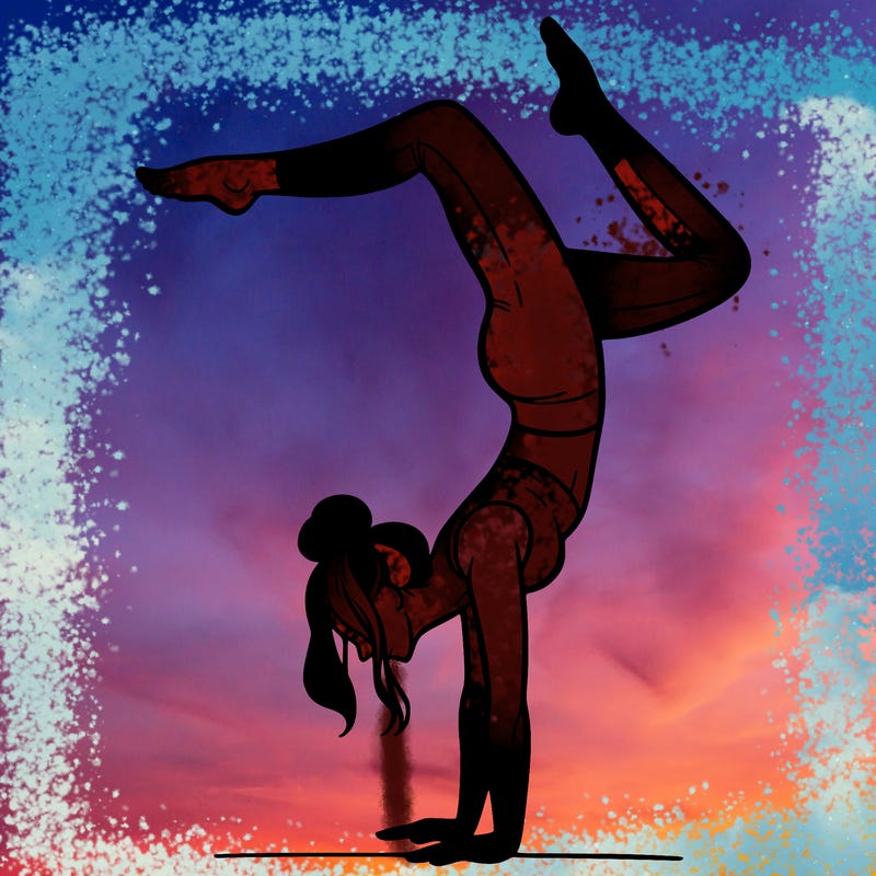 a woman doing a handstand