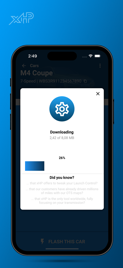 A download progress screen in the xHP Flashtool app for a BMW M4 Coupe transmission map
