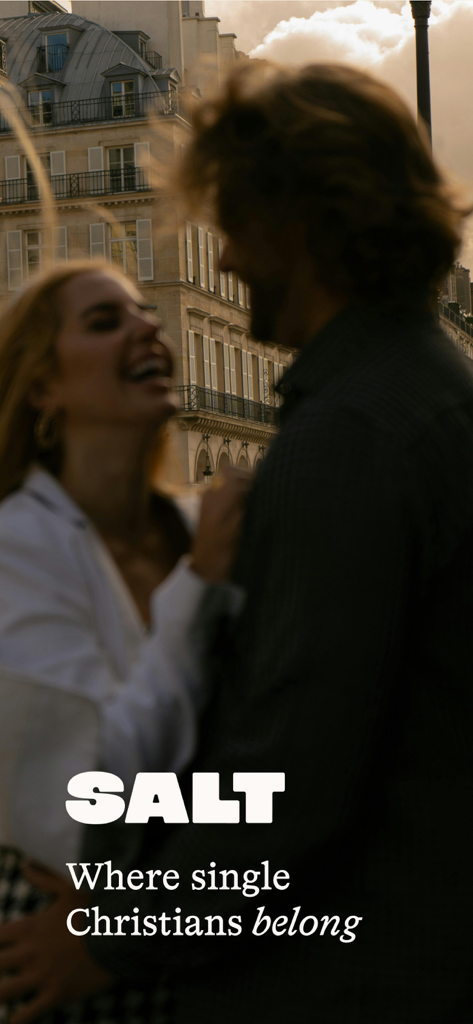 A happy couple laughing with the SALT Christian dating app logo and tagline